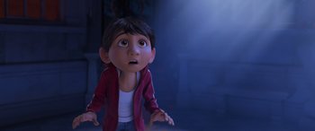 Movie still from “Coco” (2017), directed by Adrian Molina – A young girl with a surprised look on her face; Medium shot, Low angle