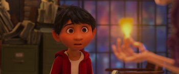 Movie still from “Coco” (2017), directed by Adrian Molina – A cartoon character looking surprised; Close Up shot, Over the shoulder angle