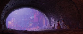 Movie still from “Coco” (2017), directed by Adrian Molina – An image of an animated scene with a person sitting on a chair in the middle of a tunnel; Extreme Wide shot, Over the shoulder angle