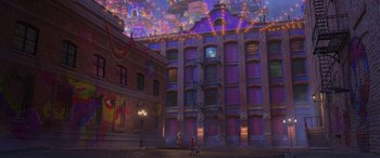 Movie still from “Coco” (2017), directed by Adrian Molina – An artistic rendering of a building with a lot of lights; Extreme Wide shot, Low angle