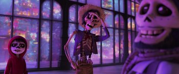Movie still from “Coco” (2017), directed by Adrian Molina – A toy skeleton wearing a cowboy hat and a purple shirt; Medium shot, Low angle