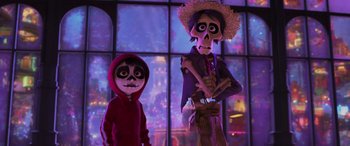 Movie still from “Coco” (2017), directed by Adrian Molina – A boy and a girl dressed up as calavera catrinas for halloween; Medium shot, Low angle