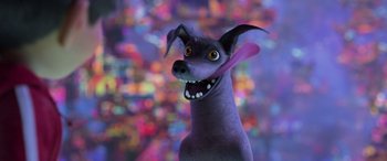 Movie still from “Coco” (2017), directed by Adrian Molina – A purple dog with a toothbrush in its mouth; Close Up shot, High angle