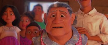 Movie still from “Coco” (2017), directed by Adrian Molina – An old man with a surprised look on his face; Close Up shot, Over the shoulder angle