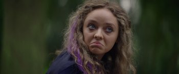 Movie still from “Color Out of Space” (2019), directed by Richard Stanley – A person with long hair; Close Up shot, Low angle