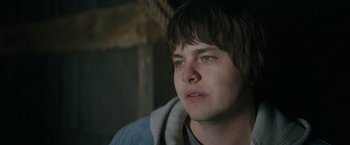 Movie still from “Color Out of Space” (2019), directed by Richard Stanley – A person looking at the camera; Close Up shot, Over the shoulder angle