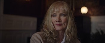 Movie still from “Color Out of Space” (2019), directed by Richard Stanley – A person with long blonde hair; Close Up shot, Over the shoulder angle