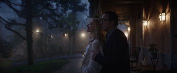 Movie still from “Color Out of Space” (2019), directed by Richard Stanley – A man and a woman standing next to each other; Medium shot, Low angle