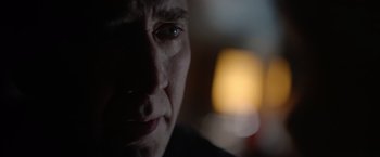 Movie still from “Color Out of Space” (2019), directed by Richard Stanley – A man's face in the dark; Close Up shot, Over the shoulder angle
