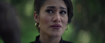 Movie still from “Color Out of Space” (2019), directed by Richard Stanley – A person wearing a black shirt; Close Up shot, Over the shoulder angle