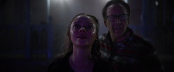 Movie still from “Color Out of Space” (2019), directed by Richard Stanley – A woman and a man looking up at the sky; Close Up shot, Low angle