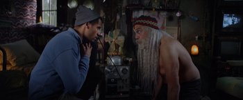 Movie still from “Color Out of Space” (2019), directed by Richard Stanley – A man and a man with long white beard; Medium shot, Over the shoulder angle