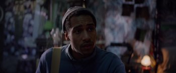 Movie still from “Color Out of Space” (2019), directed by Richard Stanley – A person wearing a hat; Close Up shot, Low angle