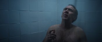 Movie still from “Color Out of Space” (2019), directed by Richard Stanley – A man in the shower with his mouth wide open; Close Up shot, Low angle