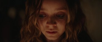 Movie still from “Color Out of Space” (2019), directed by Richard Stanley – A person's face with tears in their eyes; Close Up shot, Low angle