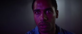 Movie still from “Color Out of Space” (2019), directed by Richard Stanley – A person looking at the camera; Close Up shot, Low angle