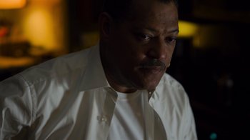 Movie still from “Contagion” (2011), directed by Steven Soderbergh – A person wearing a white shirt; Close Up shot, Low angle