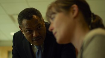 Movie still from “Contagion” (2011), directed by Steven Soderbergh – A man and a woman are looking at one another; Close Up shot, Over the shoulder angle