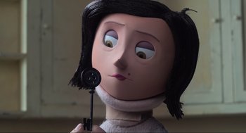 Movie still from “Coraline” (2009), directed by Henry Selick – The head of a cartoon character; Close Up shot, High angle