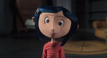 Movie still from “Coraline” (2009), directed by Henry Selick – The head of a cartoon character , coraline; Close Up shot, High angle