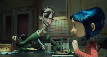Movie still from “Coraline” (2009), directed by Henry Selick – Two people sitting at a table with a plate of food in front of them; Medium shot, Over the shoulder angle