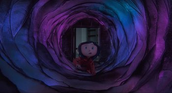 Movie still from “Coraline” (2009), directed by Henry Selick – A doll is in a tunnel with a mirror in the background; Wide shot, Overhead angle