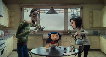 Movie still from “Coraline” (2009), directed by Henry Selick – A group of people standing around a table with a bowl; Wide shot, Over the shoulder angle