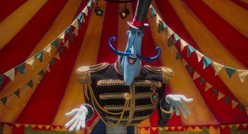 Movie still from “Coraline” (2009), directed by Henry Selick – A man in a suit and top hat is standing in front of a circus tent; Medium shot, Low angle