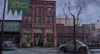 Movie still from “Coraline” (2009), directed by Henry Selick – An image of an old building on the side of the street; Extreme Wide shot, High angle