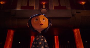 Movie still from “Coraline” (2009), directed by Henry Selick – The head of a cartoon character; Medium shot, Low angle