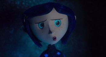 Movie still from “Coraline” (2009), directed by Henry Selick – A doll's face in a dark room; Close Up shot, Over the shoulder angle