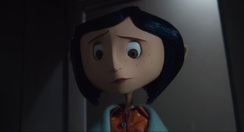 Movie still from “Coraline” (2009), directed by Henry Selick – A cartoon character's eyes and mouth; Close Up shot, Over the shoulder angle