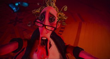 Movie still from “Coraline” (2009), directed by Henry Selick – A weird looking person wearing glasses and a pink wig; Close Up shot, High angle