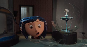 Movie still from “Coraline” (2009), directed by Henry Selick – The head of coraline; Medium shot, High angle