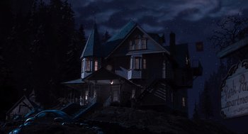 Movie still from “Coraline” (2009), directed by Henry Selick – A house that is in the dark outside at night time; Extreme Wide shot, Low angle