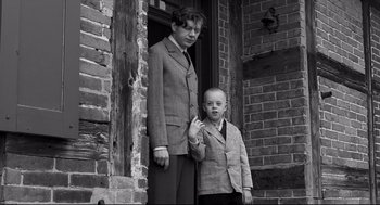 Movie still from “The White Ribbon” (2009), directed by Michael Haneke – Medium shot, High angle