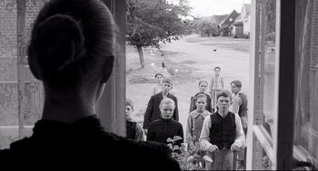 Movie still from “The White Ribbon” (2009), directed by Michael Haneke – Wide shot, Over the shoulder angle