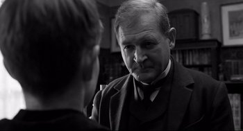 Movie still from “The White Ribbon” (2009), directed by Michael Haneke – Close Up shot, Over the shoulder angle