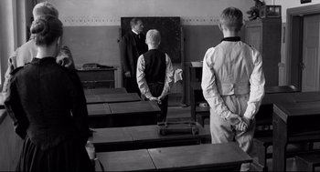 Movie still from “The White Ribbon” (2009), directed by Michael Haneke – Medium shot, Over the shoulder angle