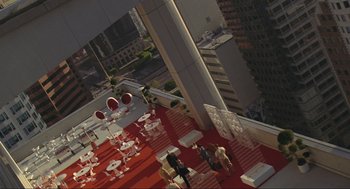 Movie still from “Crank” (2006), directed by Mark Neveldine – A view of a room from a high floor; Extreme Wide shot, Overhead angle