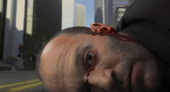 Movie still from “Crank” (2006), directed by Mark Neveldine – A person with a head wound; Extreme Close Up shot, Overhead angle