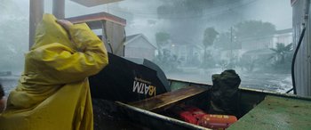 Movie still from “Crawl” (2019), directed by Alexandre Aja – A boat in the water in the rain; Wide shot, Low angle