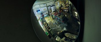 Movie still from “Crawl” (2019), directed by Alexandre Aja – An image of a store that is flooded with water; Extreme Wide shot, Overhead angle