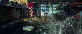 Movie still from “Crawl” (2019), directed by Alexandre Aja – A store flooded with water from a bottled water fountain; Extreme Wide shot, High angle
