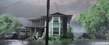 Movie still from “Crawl” (2019), directed by Alexandre Aja – A house that has been flooded by the water; Extreme Wide shot, High angle