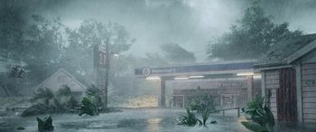 Movie still from “Crawl” (2019), directed by Alexandre Aja – A gas station in the middle of a flooded area; Extreme Wide shot, High angle