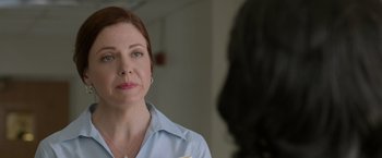 Movie still from “Creed” (2015), directed by Ryan Coogler – A person wearing a blue shirt; Close Up shot, Over the shoulder angle