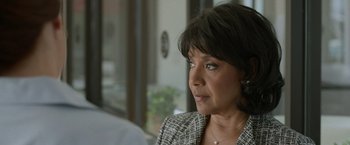 Movie still from “Creed” (2015), directed by Ryan Coogler – A person wearing a jacket; Close Up shot, Over the shoulder angle