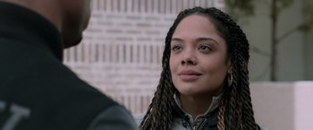 Movie still from “Creed” (2015), directed by Ryan Coogler – A person with long braids; Close Up shot, Over the shoulder angle
