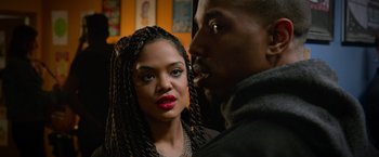 Movie still from “Creed” (2015), directed by Ryan Coogler – A man and a woman standing next to each other; Close Up shot, Over the shoulder angle